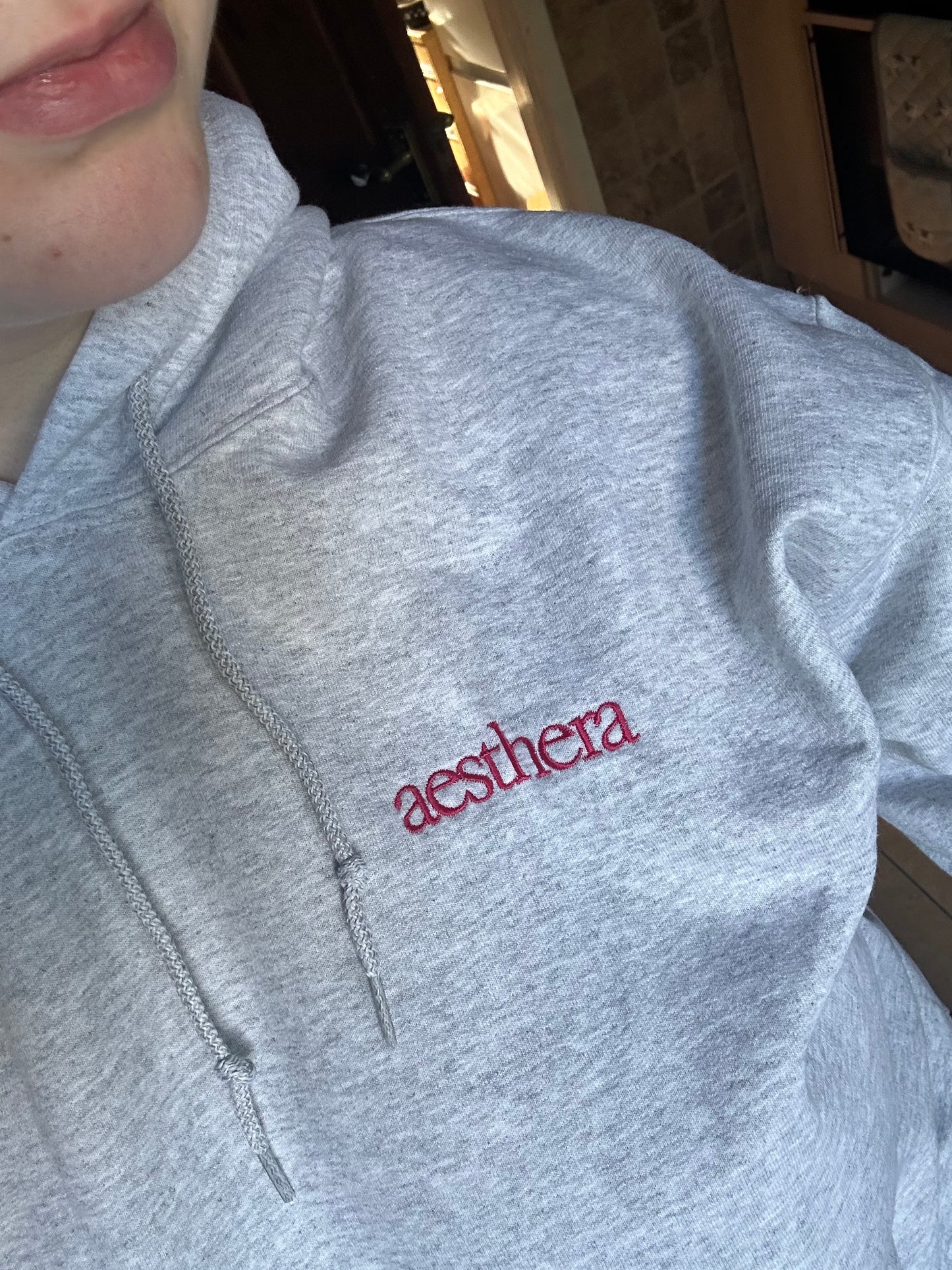 pink embroidered hoodie